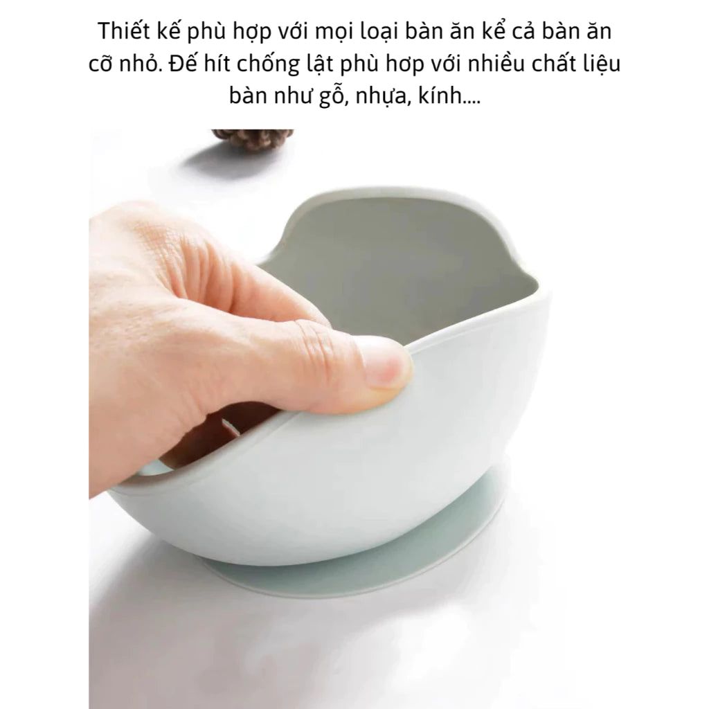 Silicone domed baby bowl set with wooden spoon for easy self-feeding, suction cup base sticks to the table without worrying about spilling