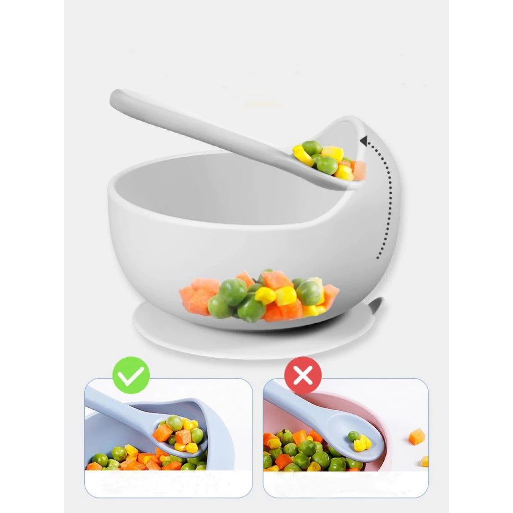Silicone domed baby bowl set with wooden spoon for easy self-feeding, suction cup base sticks to the table without worrying about spilling