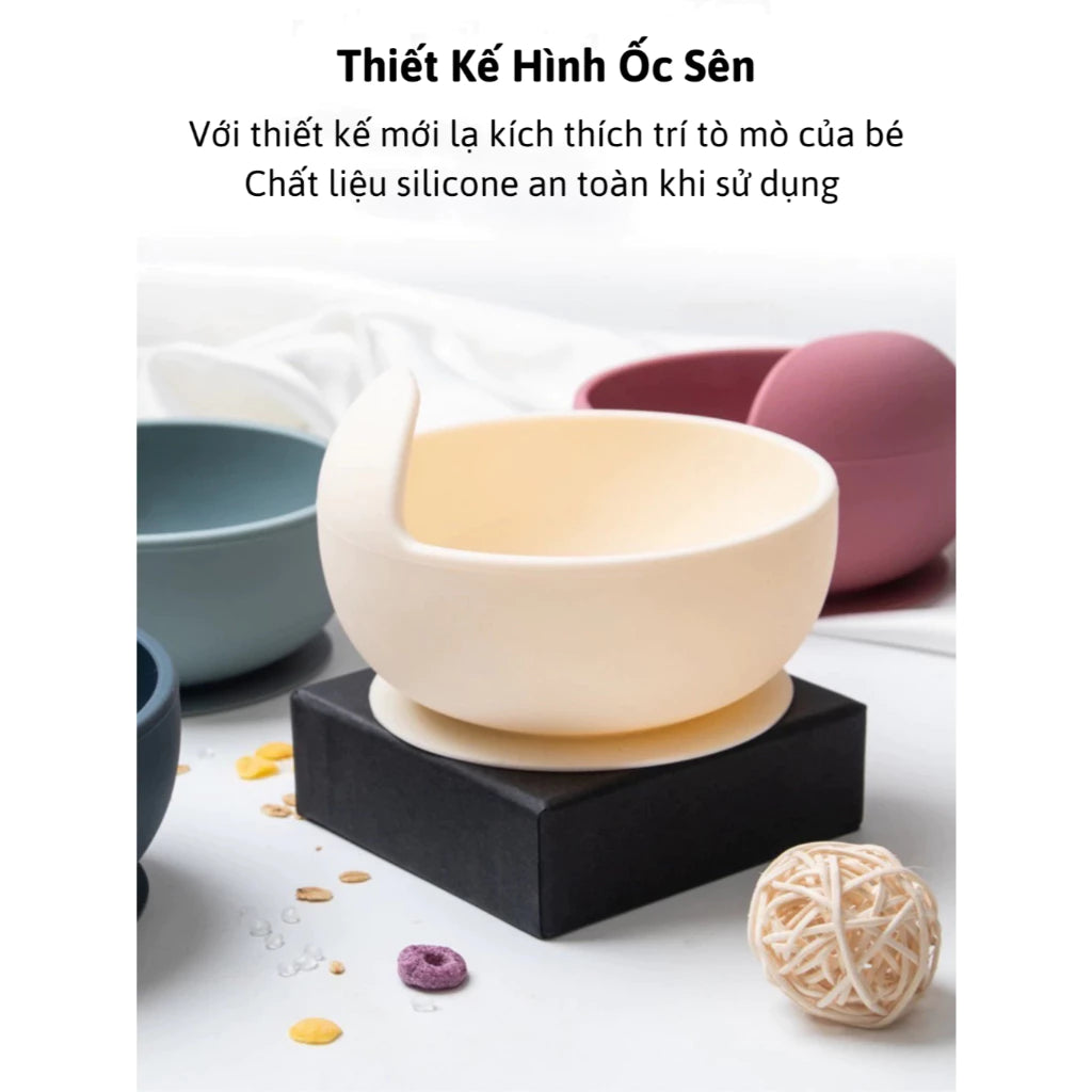 Silicone domed baby bowl set with wooden spoon for easy self-feeding, suction cup base sticks to the table without worrying about spilling